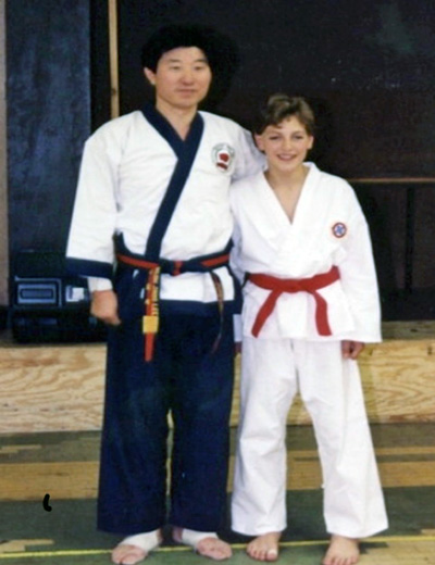 B J Lee and a young Master Auciello in a Mid-west Dobok